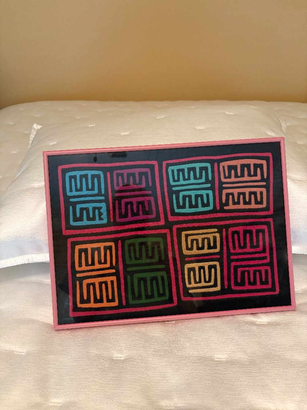A Framed Panamanian mola textile art piece